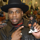 Musical artist Jason “Jam Master Jay” Mizell holds a toy figure of himself at a ceremony honoring his hip-hop group RUN-DMC’s induction into the Hollywood RockWalk February 25, 2002 at the Guitar Center in Hollywood, California. (Photo by Vince Bucci/Getty Images)